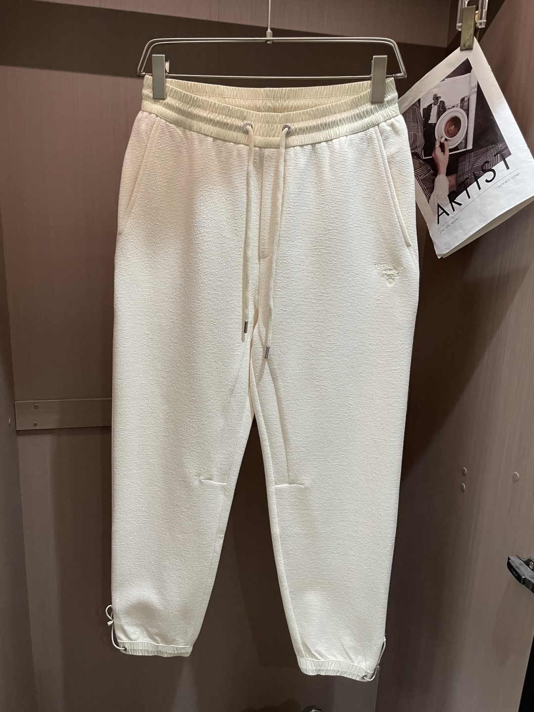 .Prad 2026春夏新款铜氨丝莫代尔空气层休闲卫裤，裤身上刺绣标志性品牌标识，客供定制品牌刻印五金配