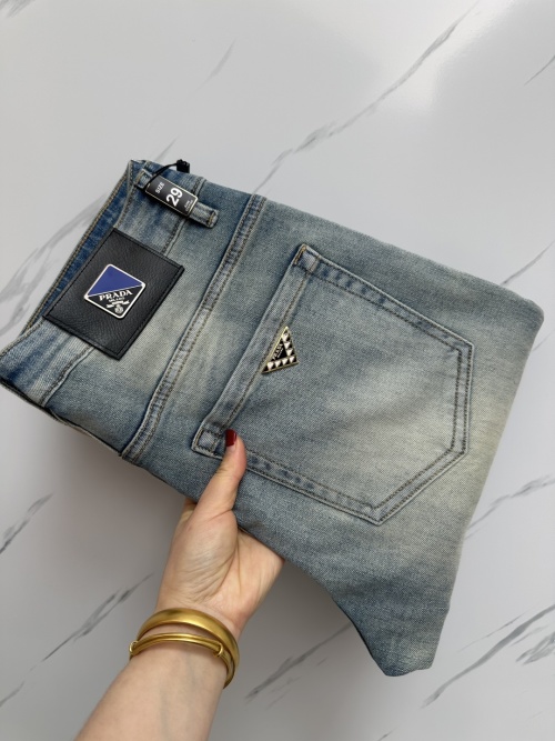 Prada Men's Distressed Denim Jeans with Triangle Logo - Stylish and Durable 1 Prada Men's Distressed Denim Jeans with Triangle Logo - Stylish and Durable