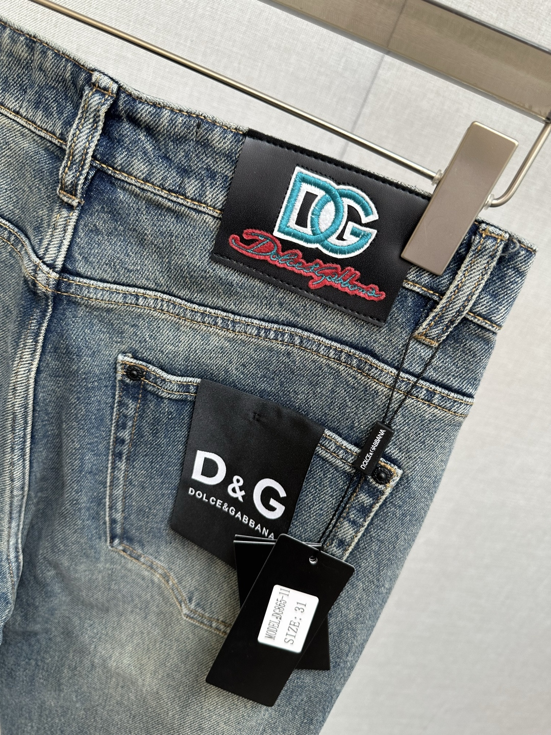 Dolce & Gabbana Men's Distressed Denim Jeans with Logo Detailing 9 cmp i1757073030842 1087 0 7