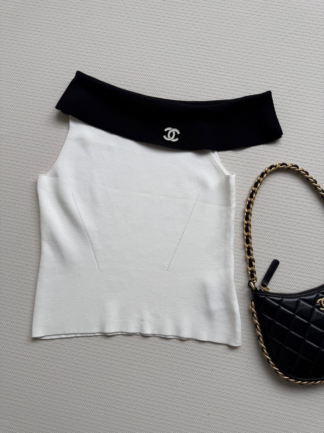 Chanel Black & White Short Sleeve Top - Chic, Asymmetrical Design 8 cmp a1747497384750 4441
