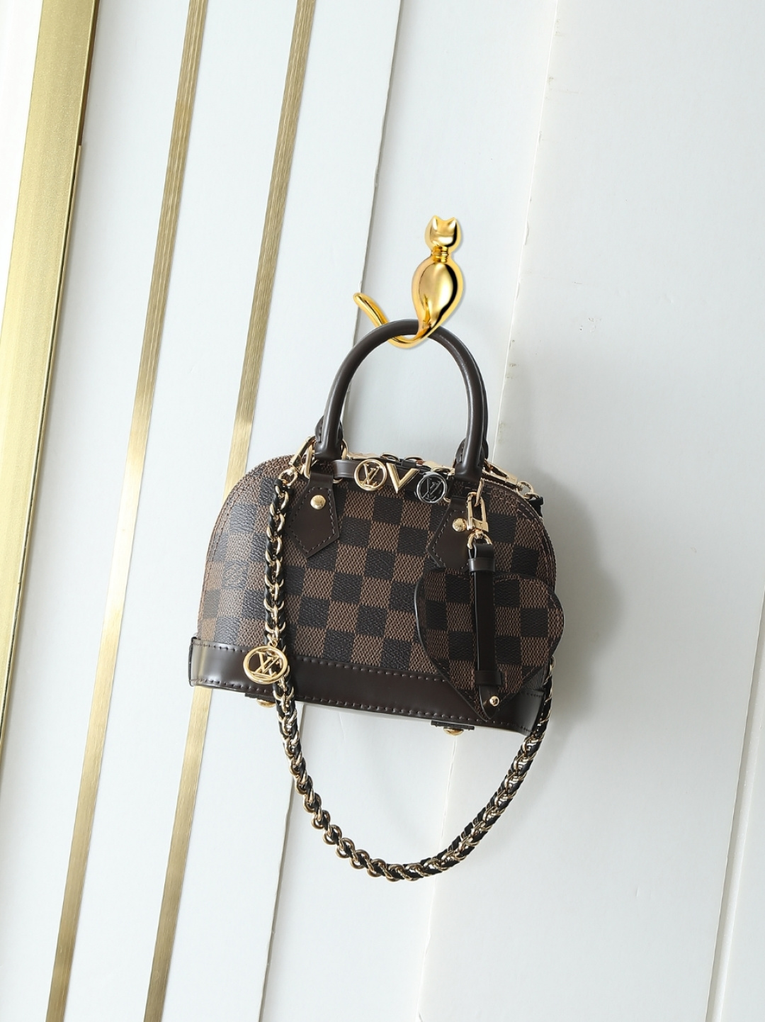 M14339 Bolso marrón con cadena y concha Alma Mini Bolso LV&I