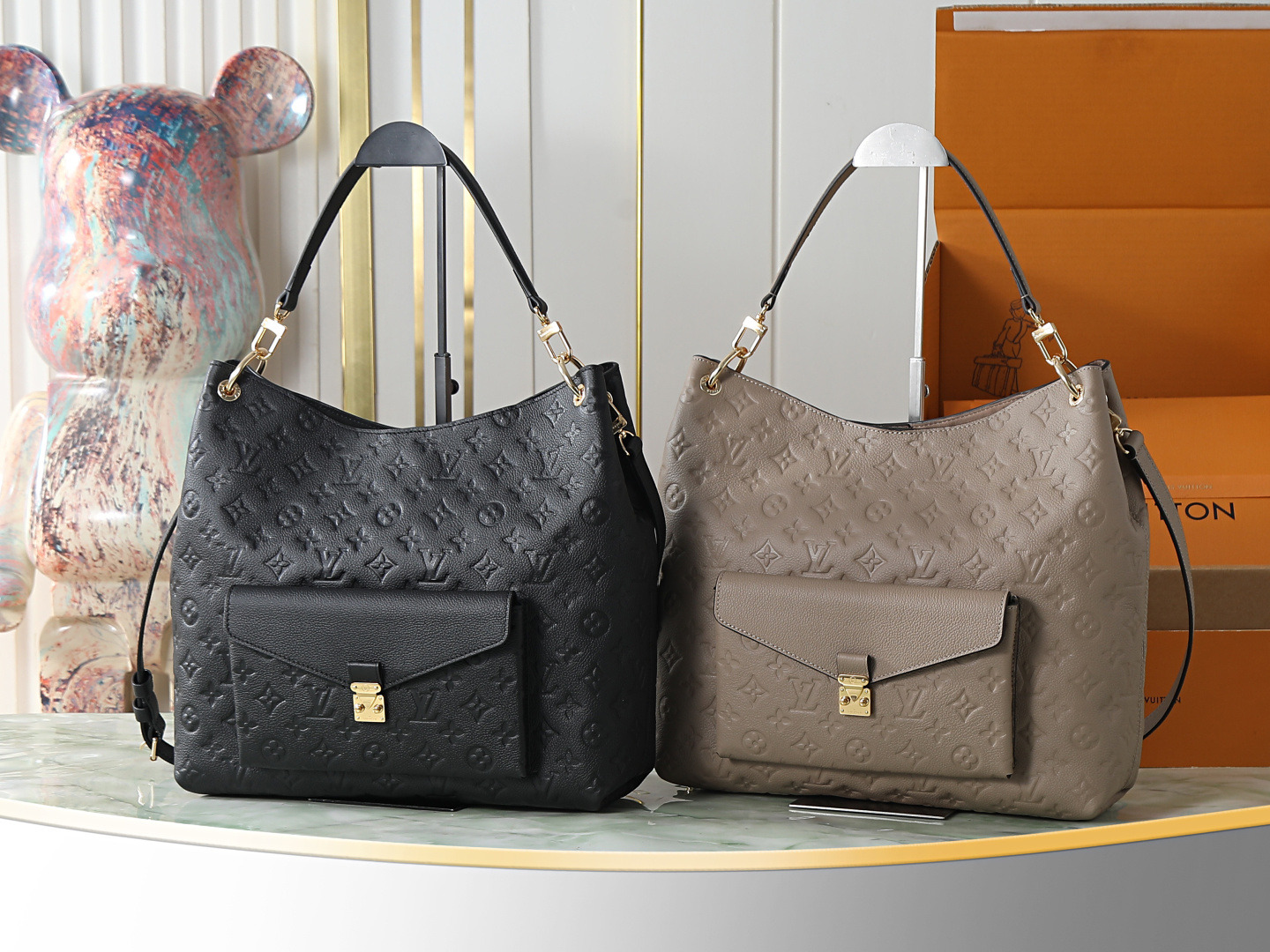 M27937 albaricoque (grabado) M27189 bolso bandolera Hobo Metis negro