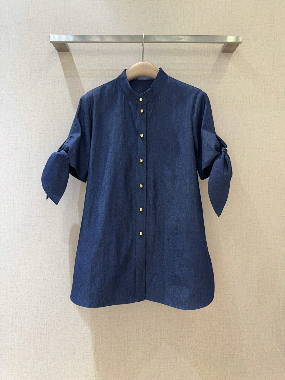 “Classic Cowboy Blue Shirt with Unique Cuff-Button Knots for Fashionable Daily Look”