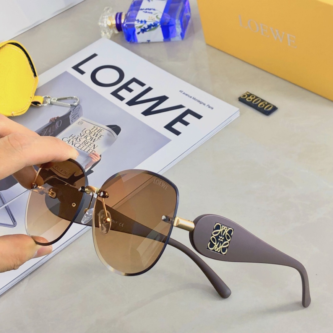 。。Loewe椭圆形无框切边墨镜女新款防紫外线尼龙镜片辣妹显脸小太阳镜