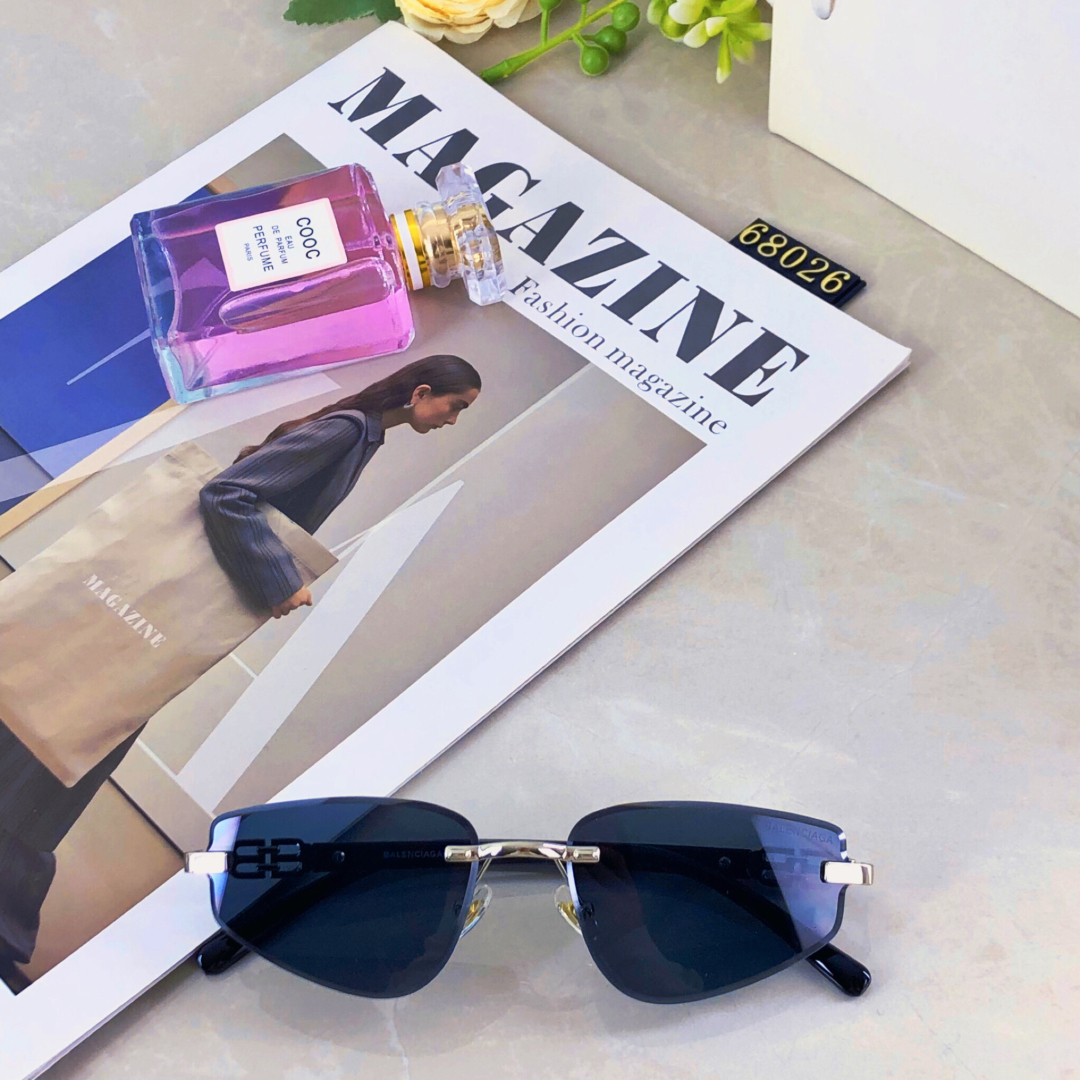 。。Balenciag*无框切边小脸墨镜女潮高级网感复古猫眼多边形太阳镜2025新款