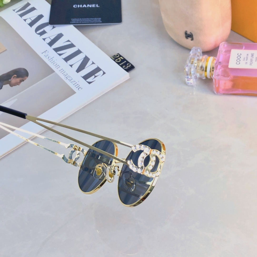 。。Chane*明星同款猫眼椭圆金属墨镜女 缕空新款百搭防紫外线太阳眼镜 