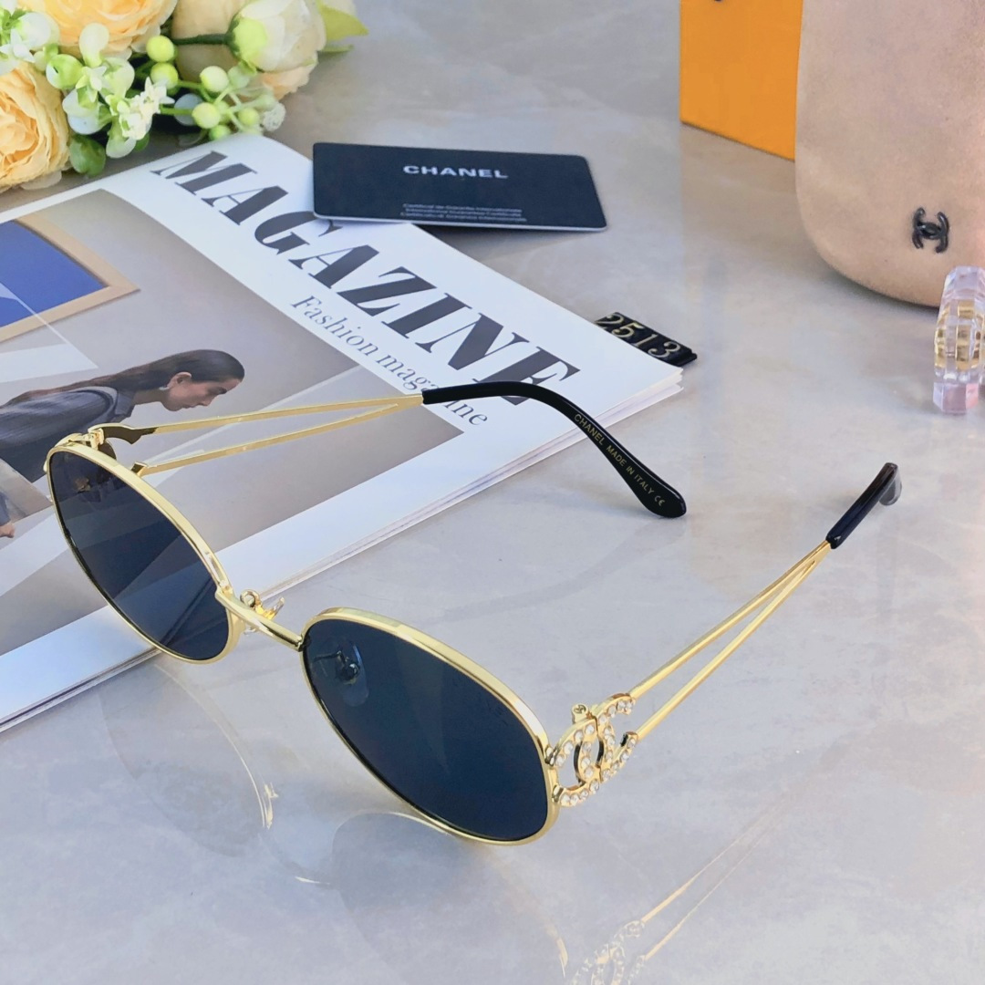 。。Chane*明星同款猫眼椭圆金属墨镜女 缕空新款百搭防紫外线太阳眼镜 
