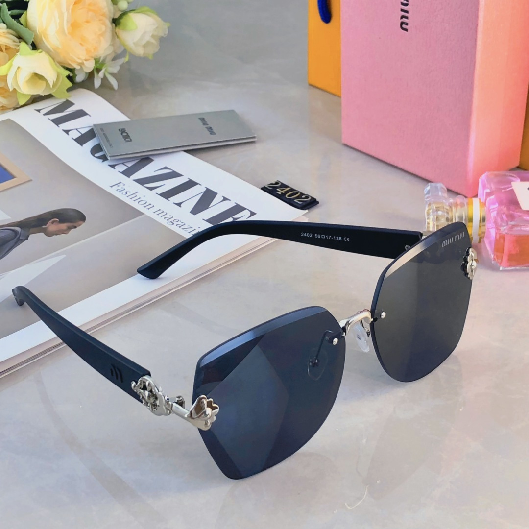 。。miumi*2025新款大框轻奢无框时尚太阳镜女防紫外线级感显脸小墨镜