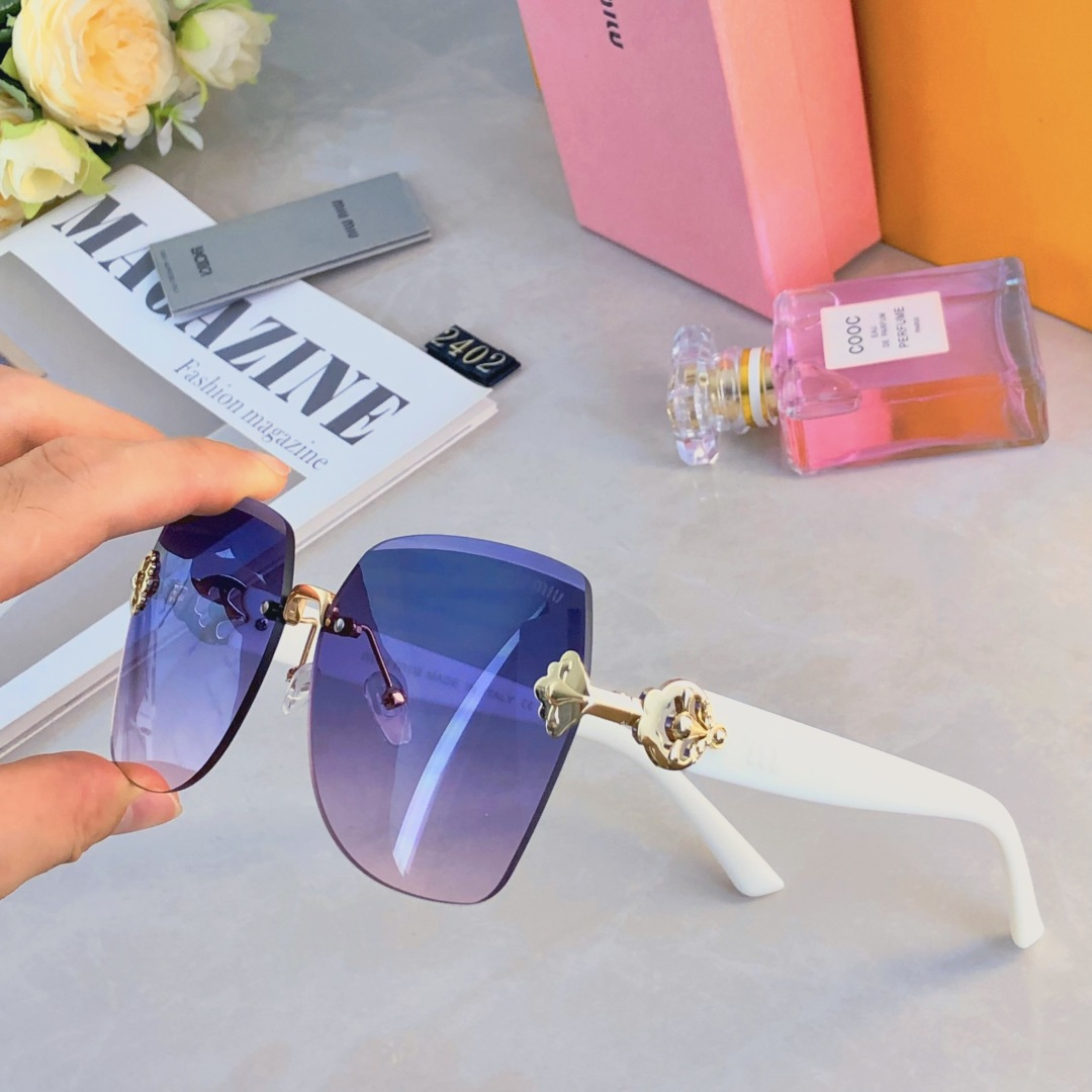 。。miumi*2025新款大框轻奢无框时尚太阳镜女防紫外线级感显脸小墨镜