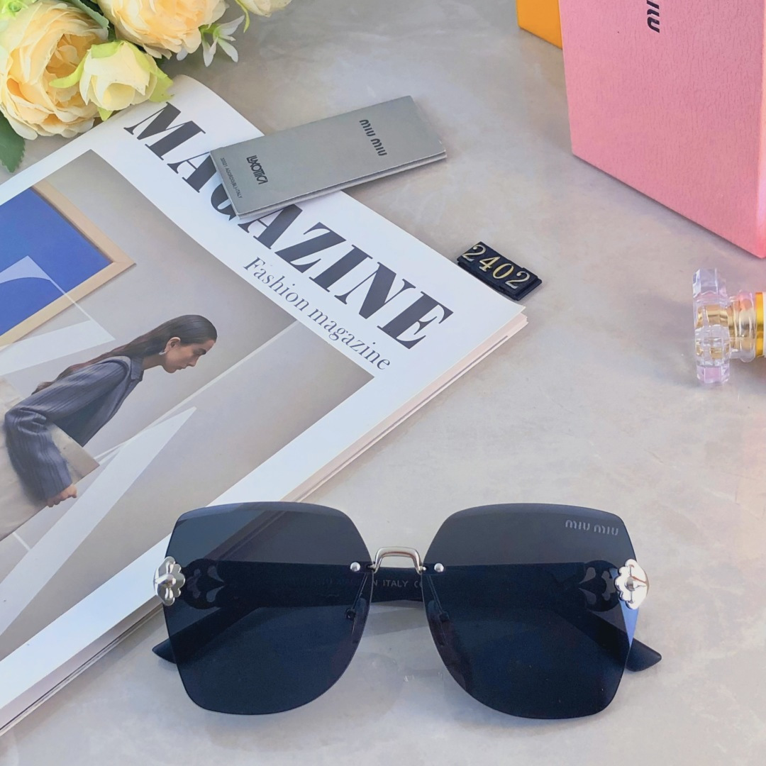 。。miumi*2025新款大框轻奢无框时尚太阳镜女防紫外线级感显脸小墨镜