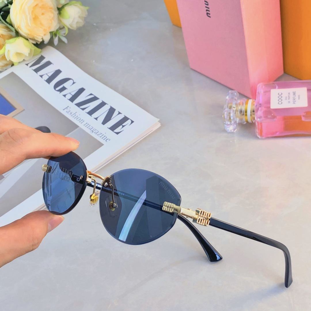 。。miumi*新款m字母欧美椭圆无框窄复古墨镜女款显脸小风辣妹个性