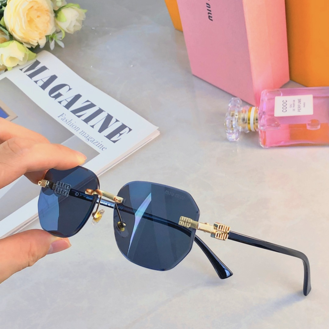 。。miumi*新款m字母欧美椭圆无框窄复古墨镜女款显脸小风辣妹个性