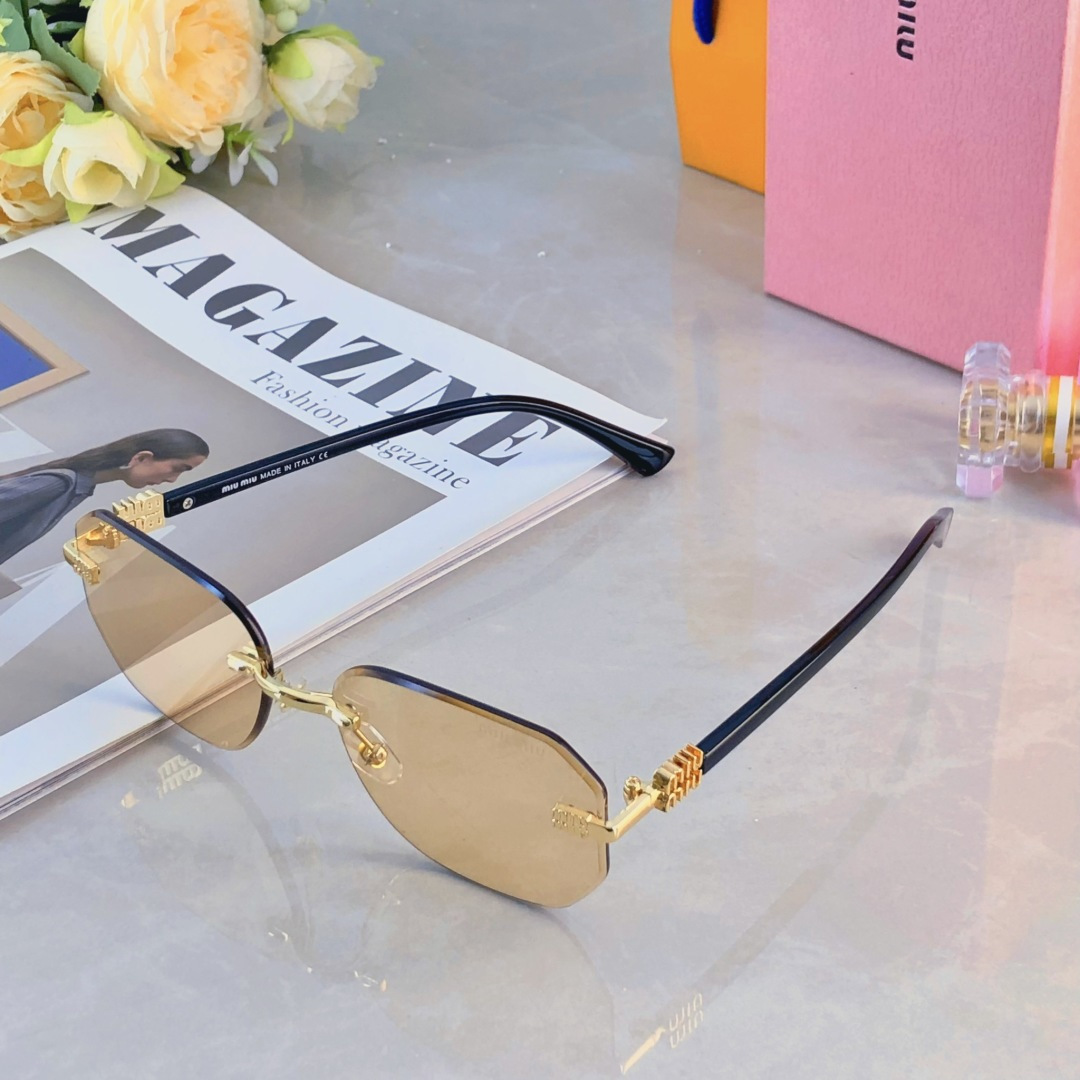 。。miumi*新款m字母欧美椭圆无框窄复古墨镜女款显脸小风辣妹个性