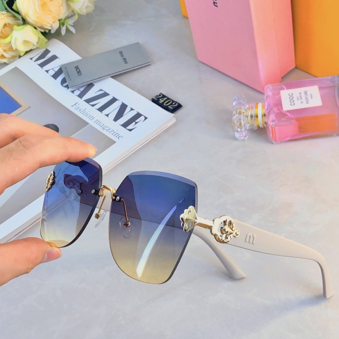 。。miumi*2025新款大框轻奢无框时尚太阳镜女防紫外线级感显脸小墨镜