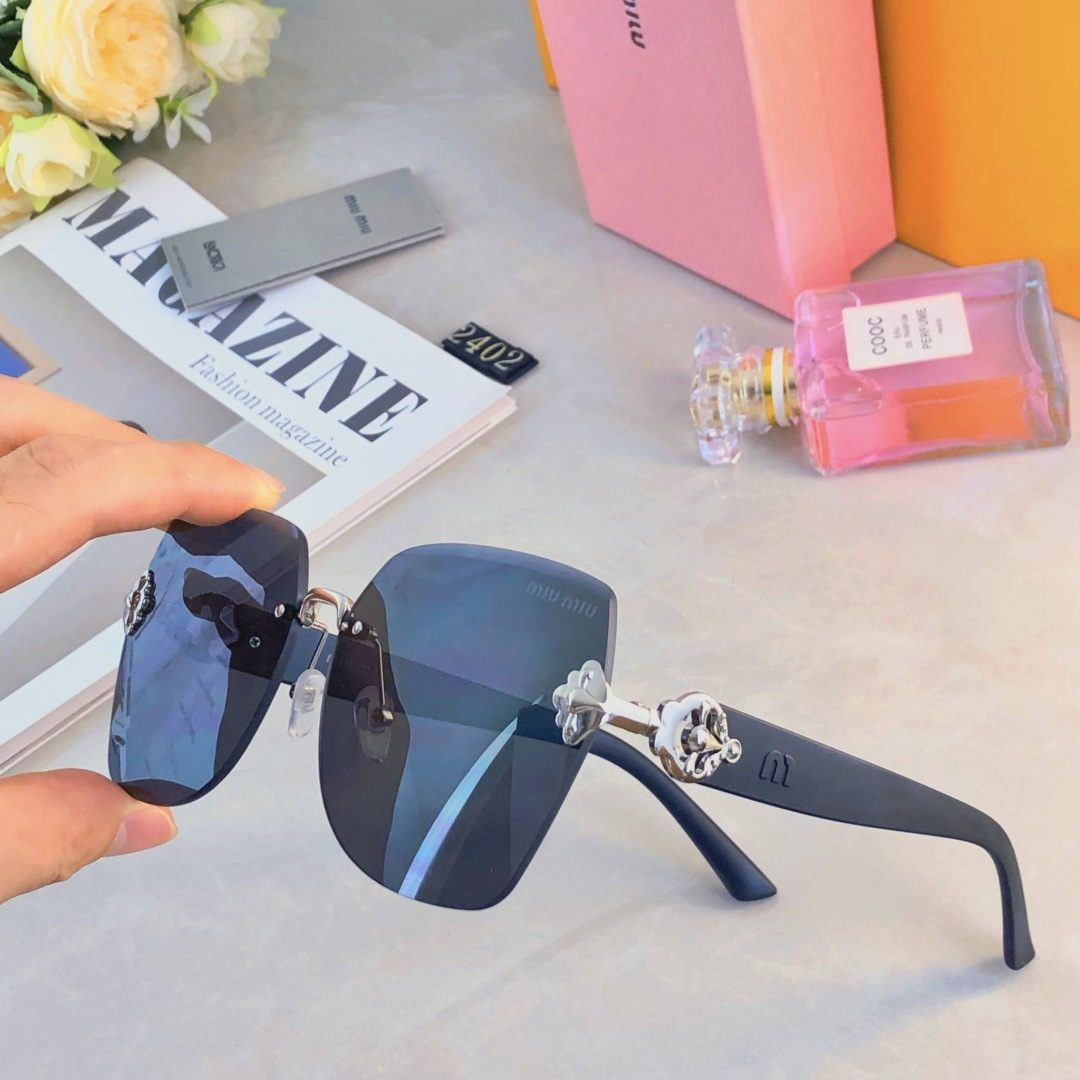 。。miumi*2025新款大框轻奢无框时尚太阳镜女防紫外线级感显脸小墨镜