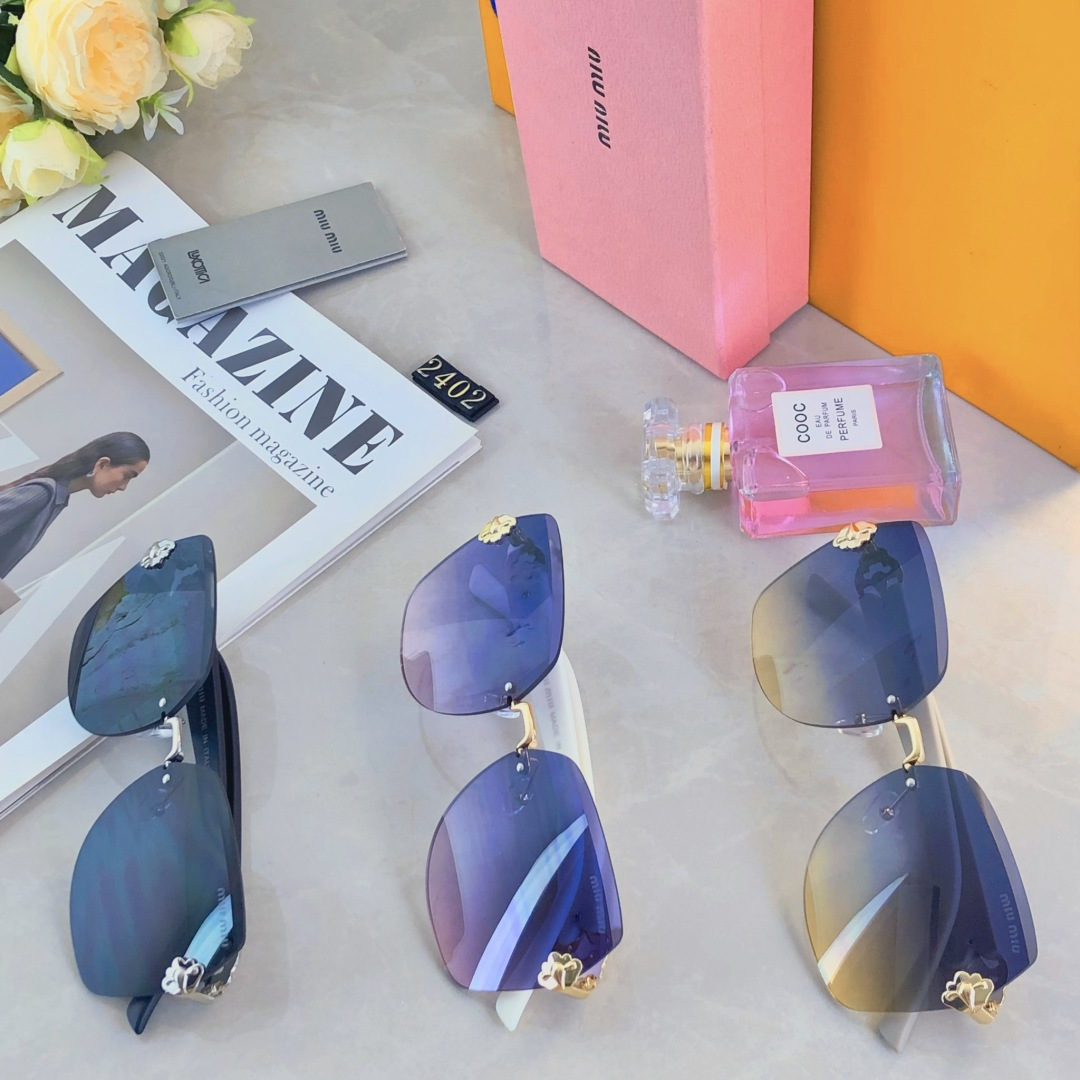 。。miumi*2025新款大框轻奢无框时尚太阳镜女防紫外线级感显脸小墨镜