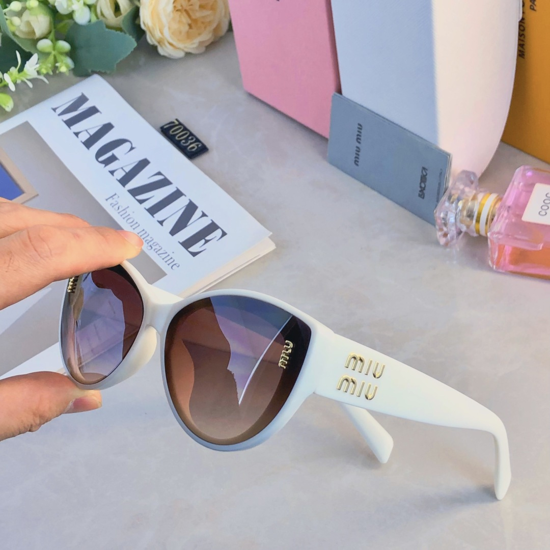 。。miumi*新款欧美大框时尚复古猫眼太阳眼镜潮女网红字母墨镜