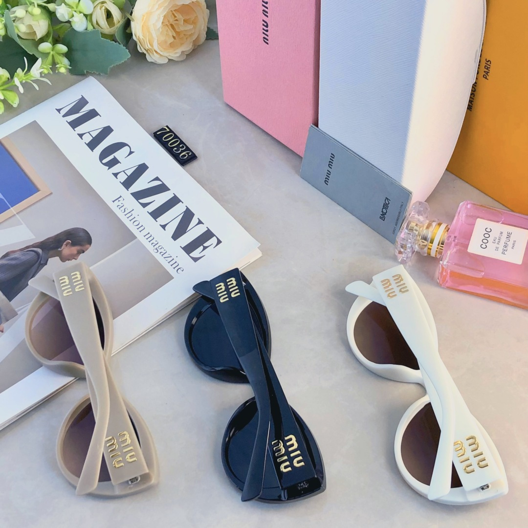 。。miumi*新款欧美大框时尚复古猫眼太阳眼镜潮女网红字母墨镜