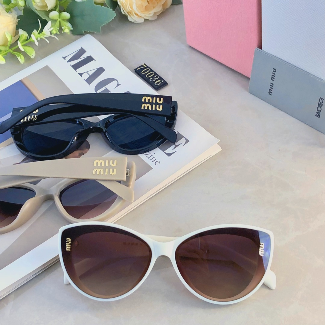 。。miumi*新款欧美大框时尚复古猫眼太阳眼镜潮女网红字母墨镜