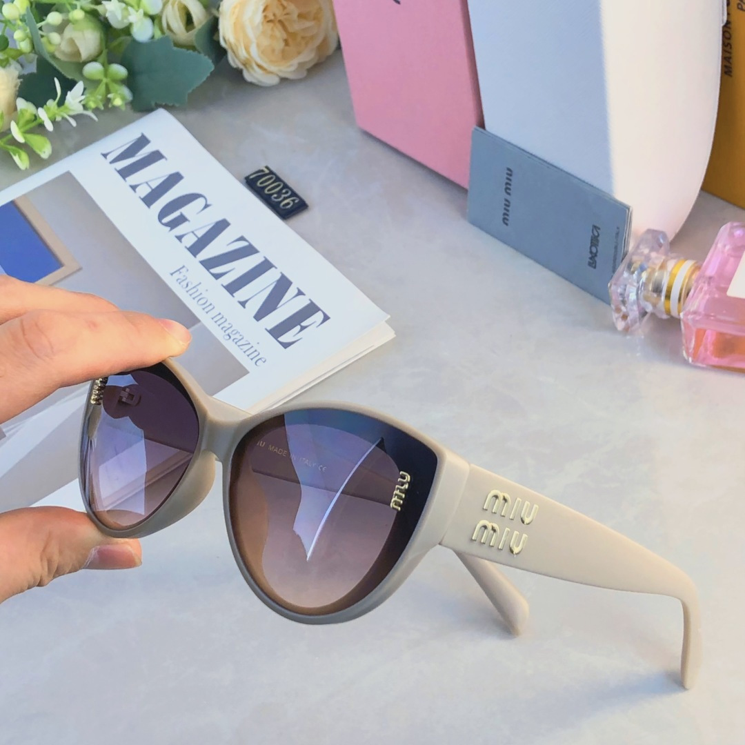 。。miumi*新款欧美大框时尚复古猫眼太阳眼镜潮女网红字母墨镜