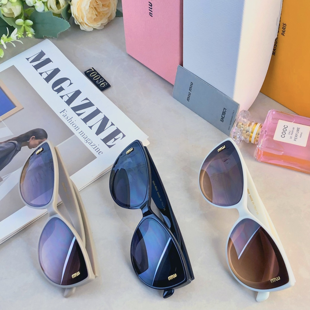 。。miumi*新款欧美大框时尚复古猫眼太阳眼镜潮女网红字母墨镜