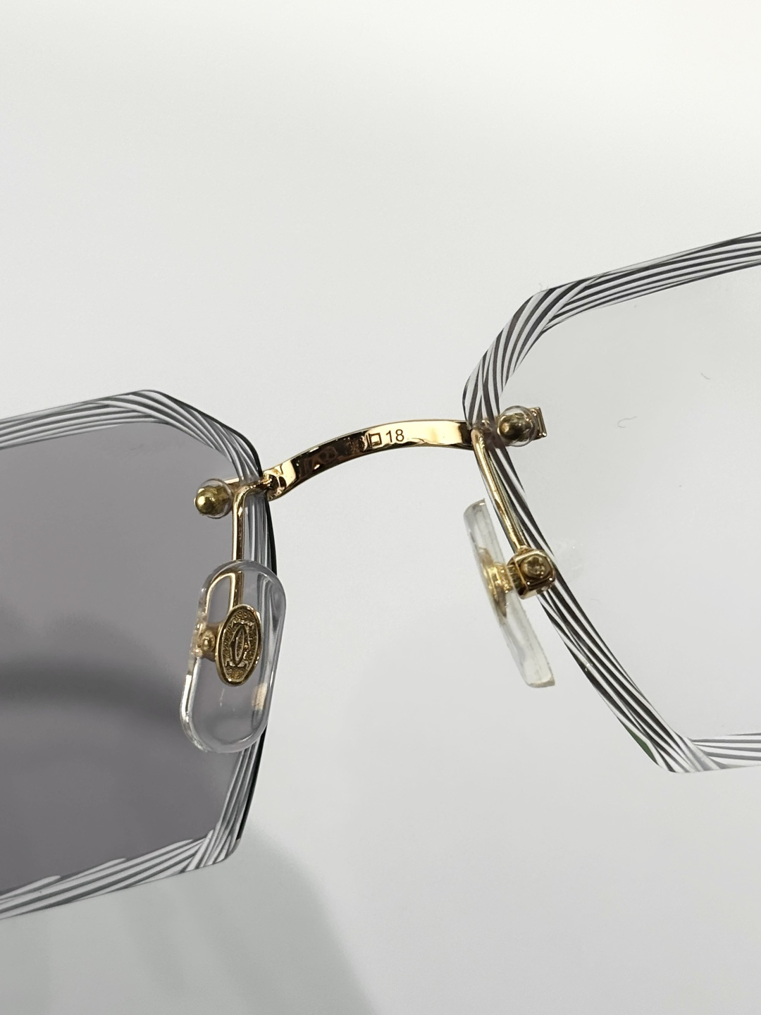 CartierMOD：CT0869SSize：57口18 变色：