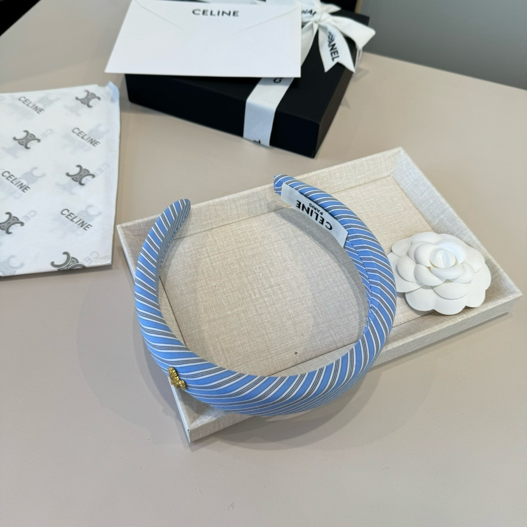 Celine Triomphe Padded Striped Headband brooch Light blue white gray striped fabric with gold-tone Triomphe logo hardware One Size standard headband width 3cm circumference 40cm
