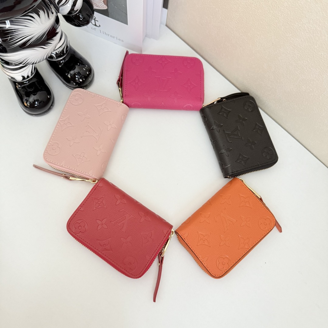 都市生活に最適なコンパクトなラウンドファスナーコインケース