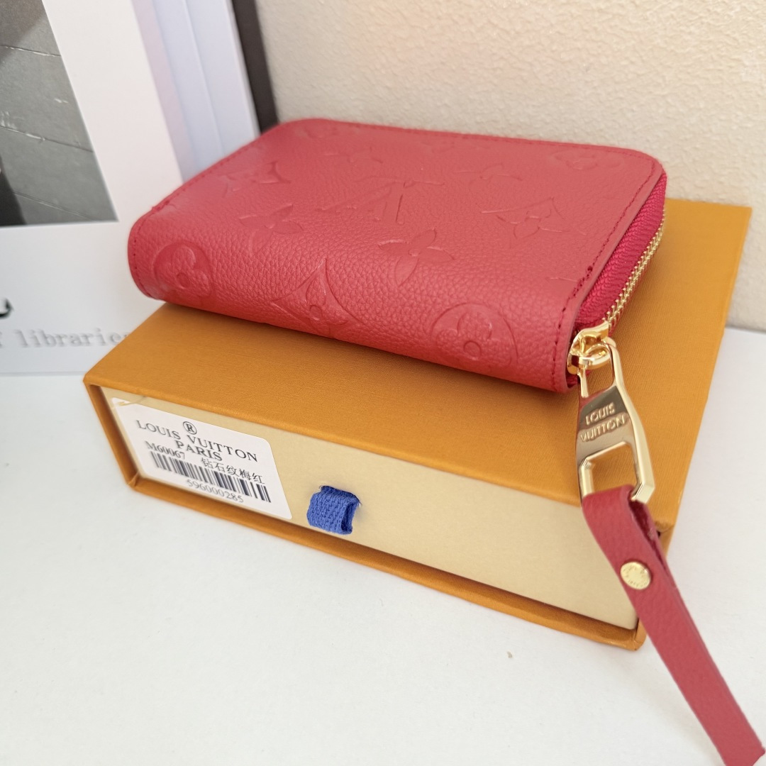 都市生活に最適なコンパクトなラウンドファスナーコインケース