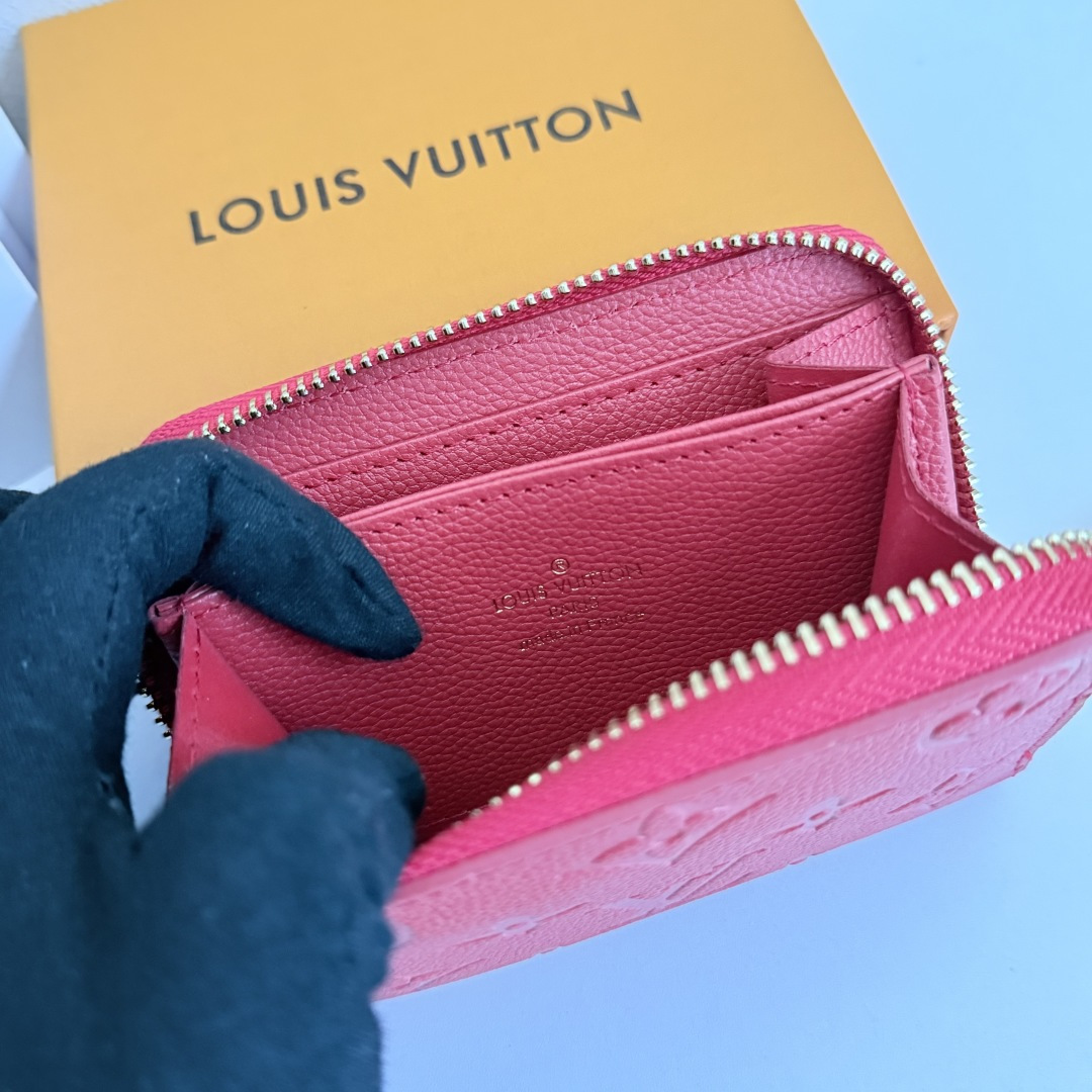 都市生活に最適なコンパクトなラウンドファスナーコインケース