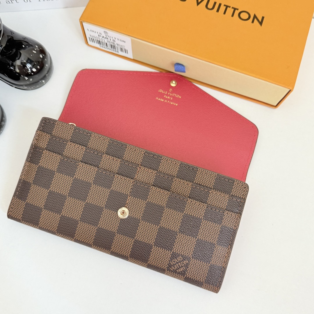 エレガントなモノグラム帆布製信封式財布