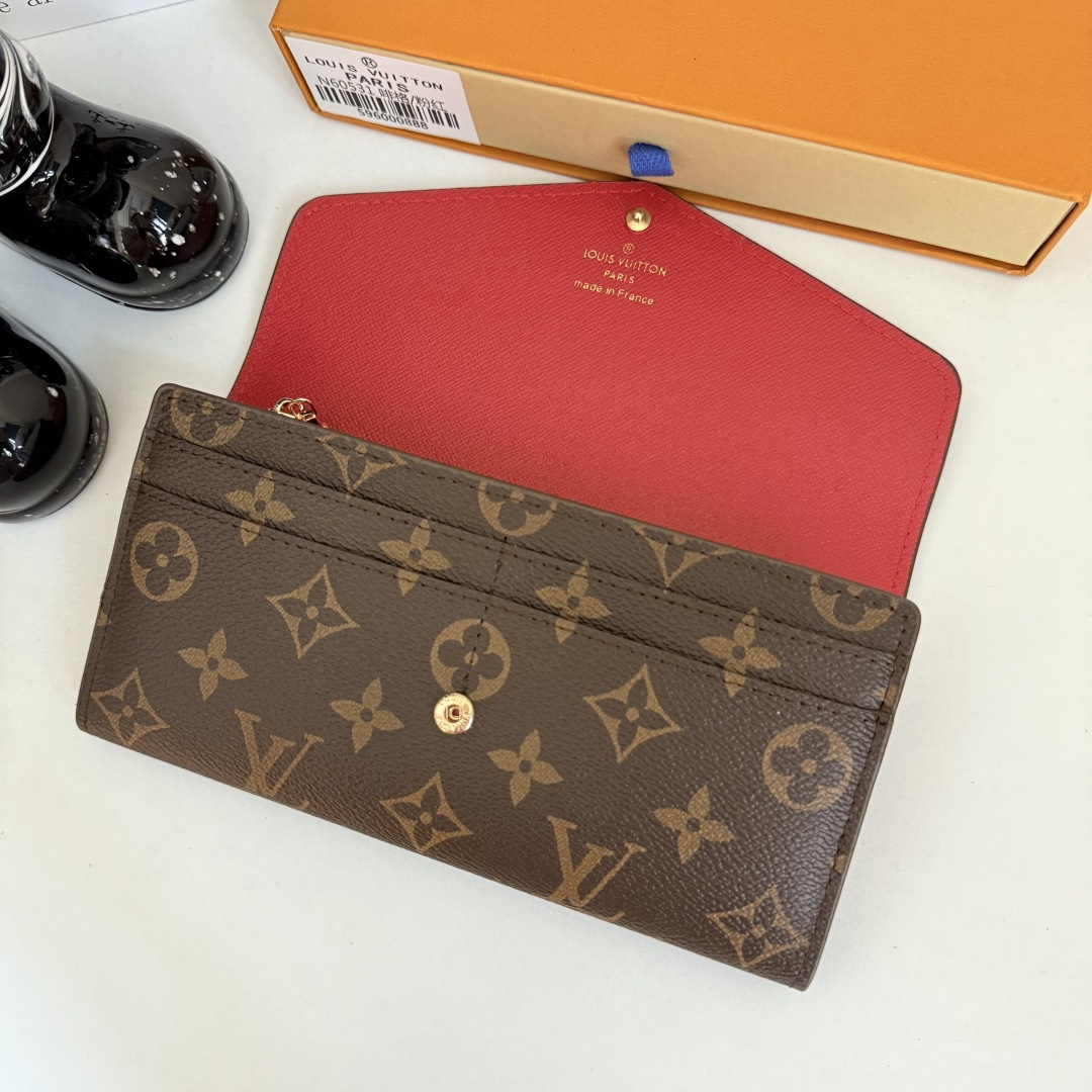 エレガントなモノグラム帆布の信封式財布