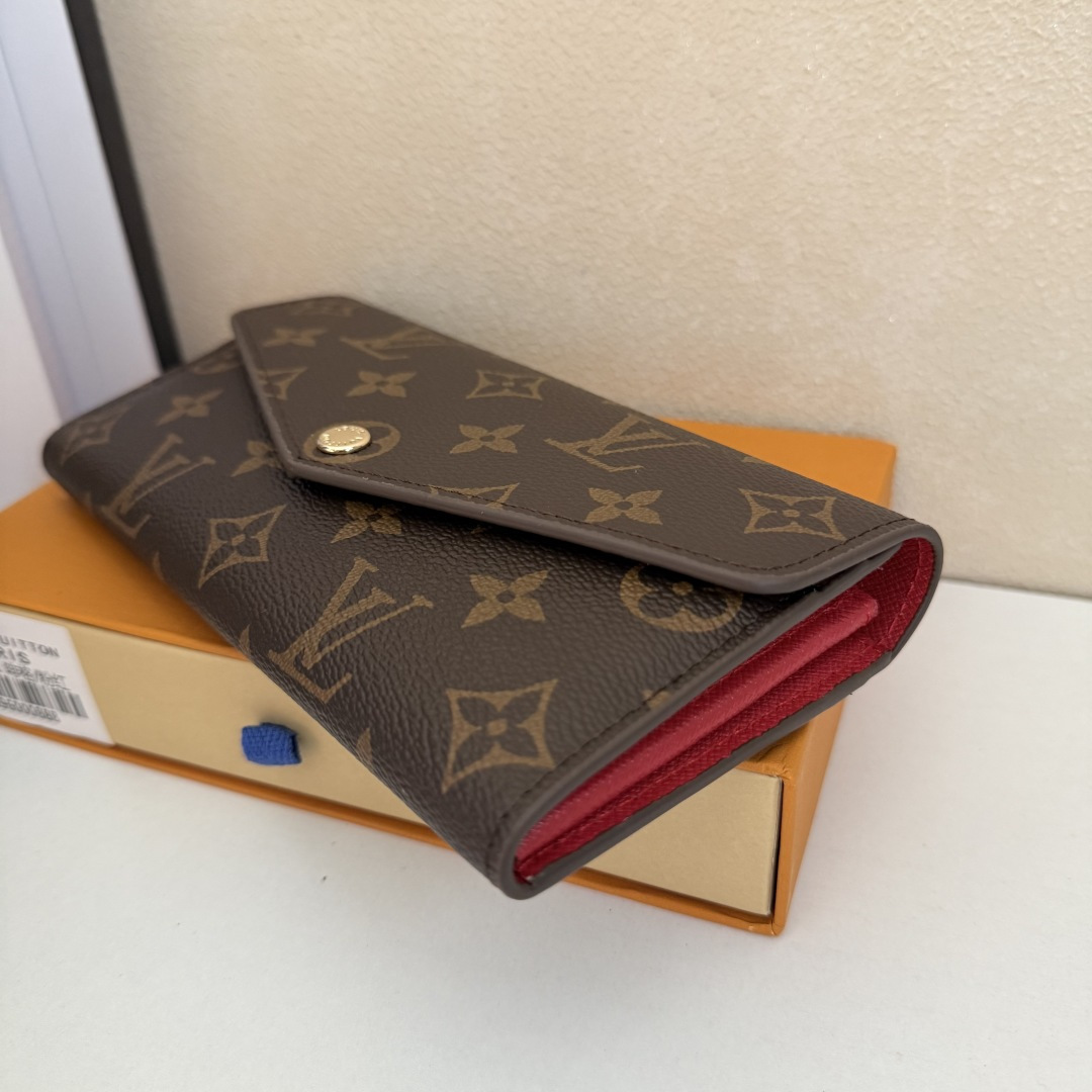 エレガントなモノグラム帆布の信封式財布