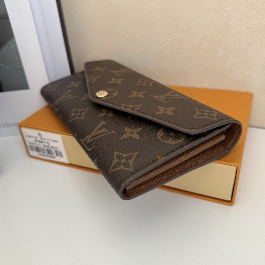 エレガントなモノグラム帆布の信封式財布