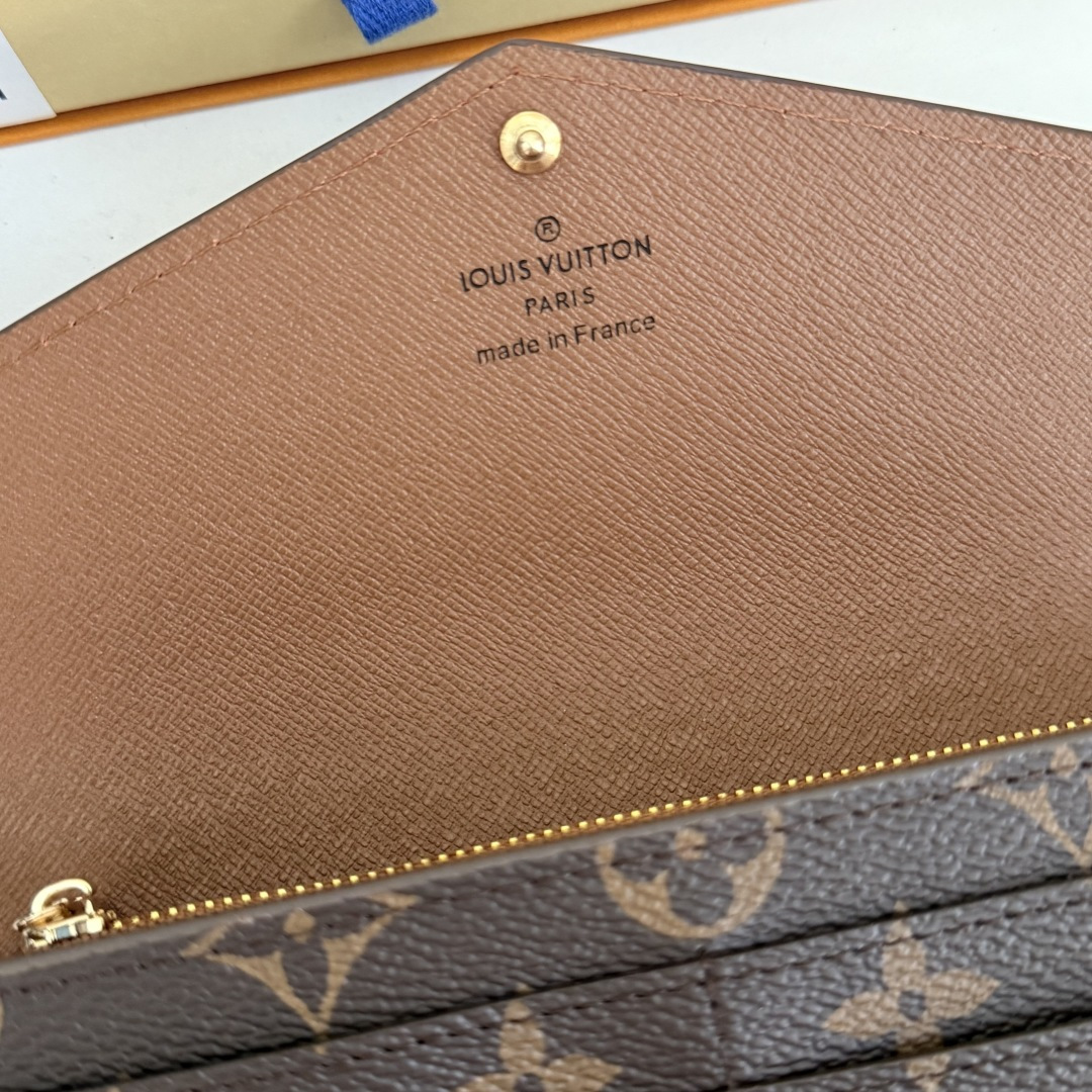 エレガントなモノグラム帆布の信封式財布