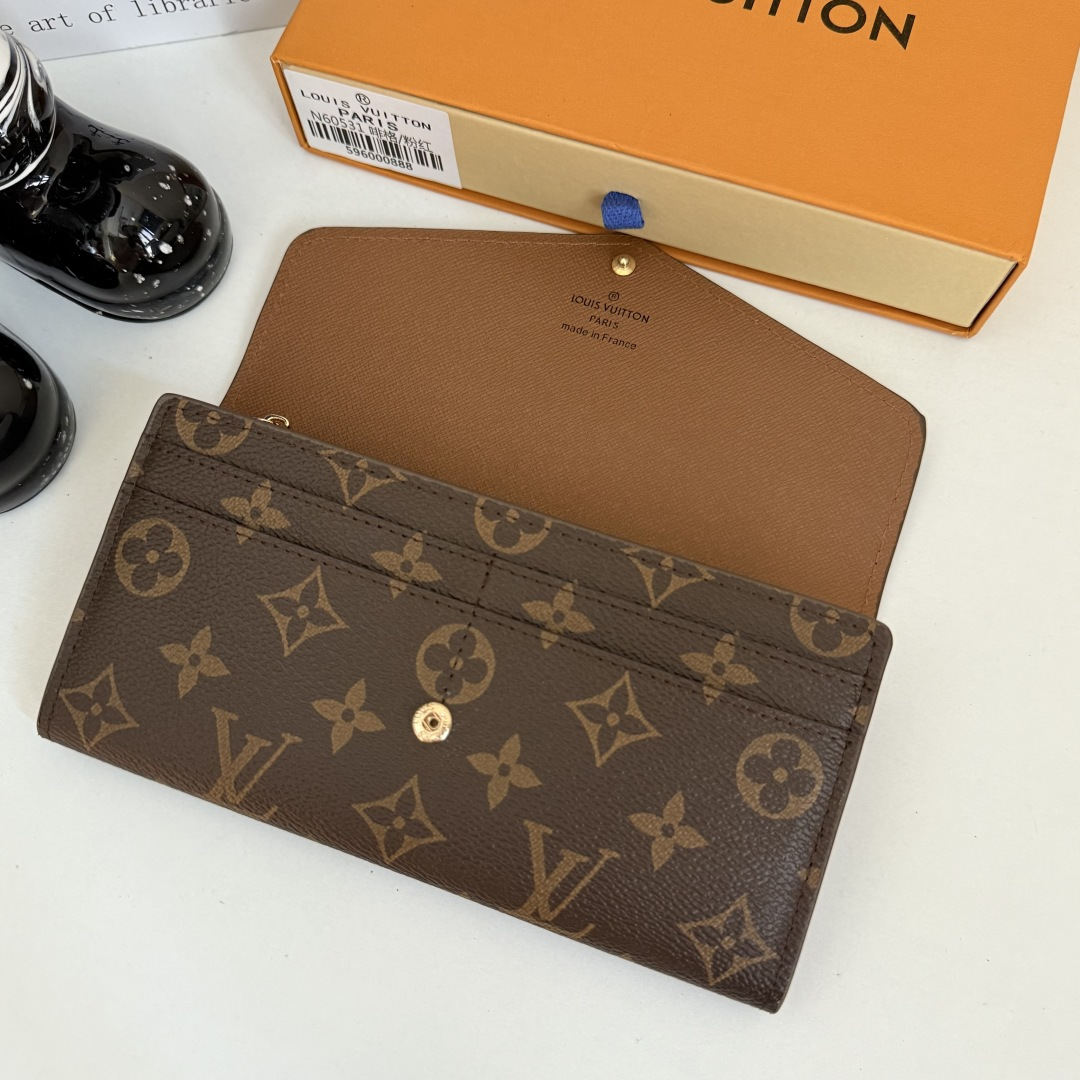 エレガントなモノグラム帆布の信封式財布