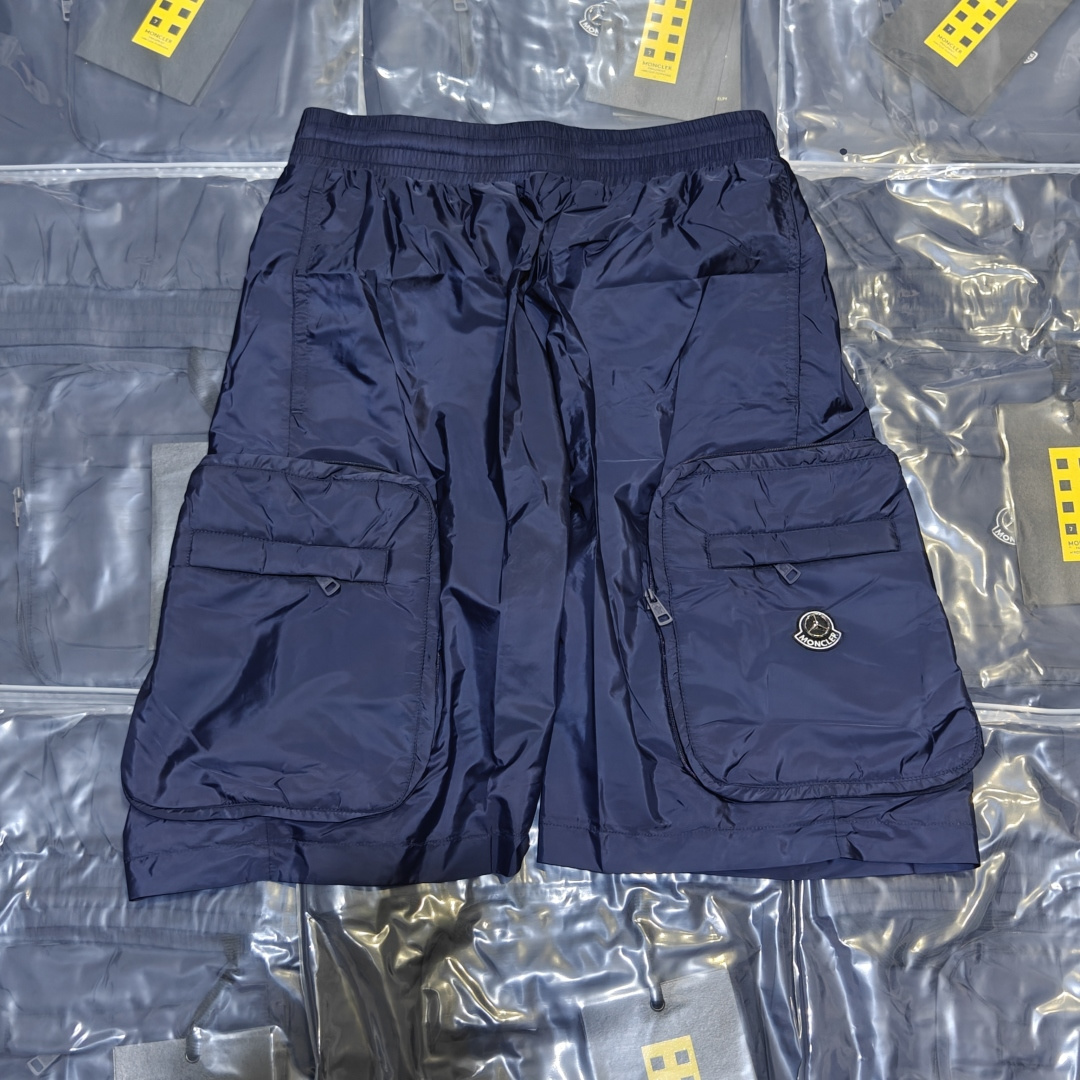 MONCLER Mouth MC Pantalones cortos de nailon plegables de marca compartida de tres partes, tiro real