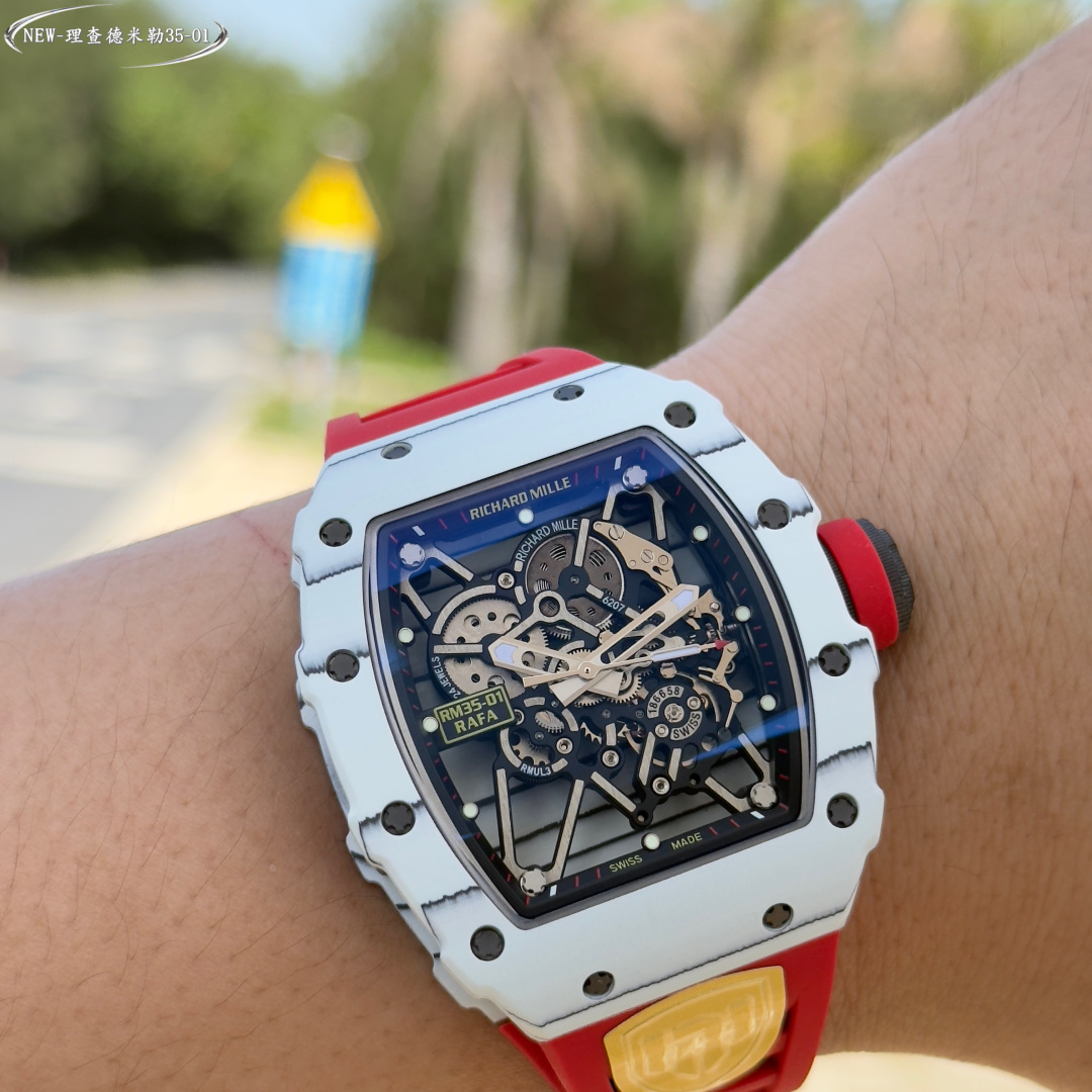 NO:602159,Get started with 'New Factory-NEW Factory' [Ceiling] RICHARD MILLE Richard Mille RM 35-01 RAFAEL NADAL carbon fiber watch - as a ticket for billionaires 1 movement is currently the highest version of the movement on the market, exclusively developed original RMUL3 hollow integrated movement, white sapphire shock absorber, after long-term testing, the stability is quite high, the movement is polished in place, (original synchronization) 2 The case is imported NTT, made of original textured carbon fiber, lightweight  Grade watch, weighing only 50g, the inner tank and watch cover steel parts are made of titanium alloy material, and CNC high-precision processing makes the watch case fit perfectly and seamlessly!  Truly original and authentic details. 3 Dial: The hollow dial with the classic black and red track inner shadow shows the unique charm of the watch. 4: The watch mirror is made of high-curved sapphire mirror and double-sided electroplated high-permeability film, which has an anti-glare effect, clear and exquisite. 5: The choice of natural rubber strap and woven Velcro strap,  6: Titanium alloy folding clasp, original mold opening, clear and three-dimensional engraving, perfectly restoring the original shape, the spring leaf is also made of titanium metal, the elastic effect is better and more durable 7: The screws are all made of titanium metal plating dark gray process, synchronizing the original effect. 'NEW Factory' achieves new breakthroughs and treats watch lovers with 'heart'!  ,19860909上手『新厂-NEW Factory』【天花板】RICHARD MILLE理查德米勒RM 35-01 RAFAEL NADAL碳纤维腕表——作为亿万富豪的入场劵 1机芯目前市场最高版本机芯,独家研发原装RMUL3镂空一体机芯、白宝石避震器、经过长期测试,稳定性相当高,机芯打磨到位,（原装同步） 2表壳进口NTT 原装纹路碳纤维打造、轻量 级表款,克重仅 50g、内胆与表盖钢件采用钛 合金材料、CNC 高精密加工、使表壳配合完美 无缝隙！真正做到原装正品细节. 3表盘:镂空表盘搭配经典黑红赛道内影展现腕 表独有魅力 4:表镜采用高弧度蓝宝石镜面双,并采用双面电镀高透膜,具有防眩效果,清晰而精致. 5:表带天然橡胶表带与编制魔术贴表带选 择、 6:表扣钛合金折叠表扣,原装开模,刻字清晰立体,完美还原正品形状,弹簧片同样采用钛金属,弹性效果更好更持久 7:螺丝全部采用钛金属电镀深灰色工艺,同步原装效果 『新厂-NEW Factory』实现新突破,用“心”对待腕表爱好者！,,Watch