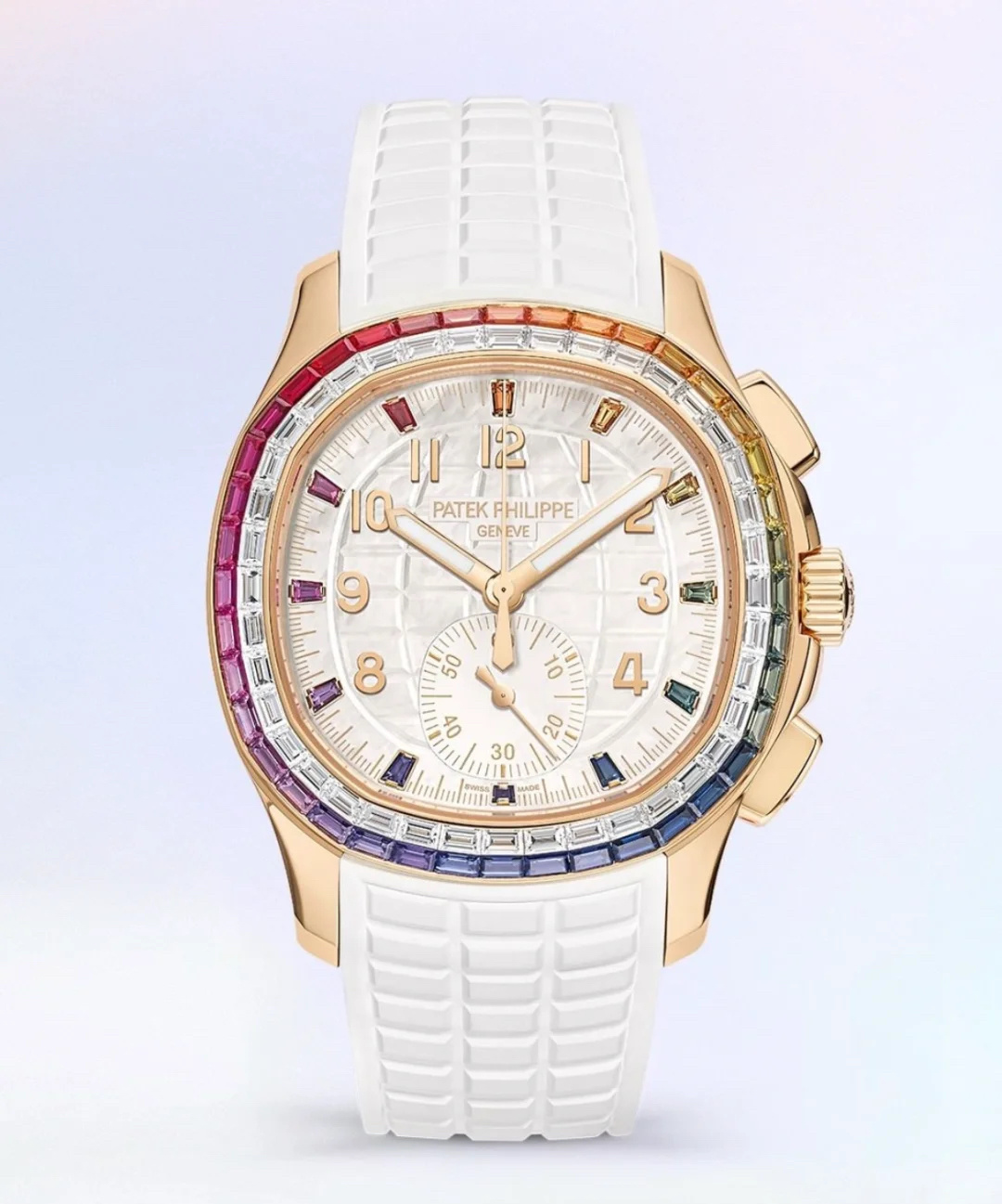 NO:689127,Unify PPM Mods, Patek Philippe Aquanaut Luce-'Rainbow' chronograph watch!  The Aquanaut Luce 'Rainbow' chronograph watch is designed for dynamic and modern neutrals. It is crafted from rose gold and is decorated with baguette diamonds and colored sapphires using invisible setting technology, blooming with rainbow brilliance. Movement: using 'Dandong' modified CH28520 self-winding mechanical movement. White mother-of-pearl dial, engraved with Aquanaut relief pattern, long colored sapphire hour markers and gold three-dimensional numerals.  The diameter is 39.9 mm from 10 o'clock to 4 o'clock (the same as the original). The ring is made of 'rhinestone protection'. Original: 40 colored sapphires 2.31 carats (bezel). 40 diamonds 2.05 carats (bezel). 12 colored sapphires 0.31 carats (hour markers). 10 diamonds 0.36 carats (folding clasp).  A total of 52 long-shaped colored sapphires (2.62 carats) and 50 long-shaped diamonds (2.41 carats). Strap/buckle: composite material strap, patented diamond folding clasp. The PPM team purchased the original and took 10 months to re-engrav it. It is a sincere work.,,patek philippe19860909统一 PPM Mods,百达翡丽Aquanaut Luce-“彩虹”计时腕表！ Aquanaut Luce“彩虹”计时腕表专为充满活力的现代中性设计,选用玫瑰金材质匠心打造,并运用隐形镶嵌技艺镶饰长形钻石与彩色蓝宝石,绽放彩虹光彩. 机芯:采用“丹东”改CH28520自动上弦机械机芯. 白色珍珠母贝表盘,镌刻Aquanaut浮雕图案,长形彩色蓝宝石时标和金质立体字块. 直径10时至4时位置39.9毫米（原装一致） 圈口采用“水钻防制”原装的:40颗彩色蓝宝石2.31克拉（表圈）. 40颗钻石2.05克拉（表圈）. 12颗彩色蓝宝石0.31克拉（时标）. 10颗钻石0.36克拉（折叠式表扣）. 共计52颗长形彩色蓝宝石（2.62克拉）以及50颗长形钻石（2.41克拉）. 表带/表扣:复合材质表带,专利镶钻折叠式表扣. PPM团队购置原装耗时10个月复刻,精诚之作.,,patek philippe,Watch