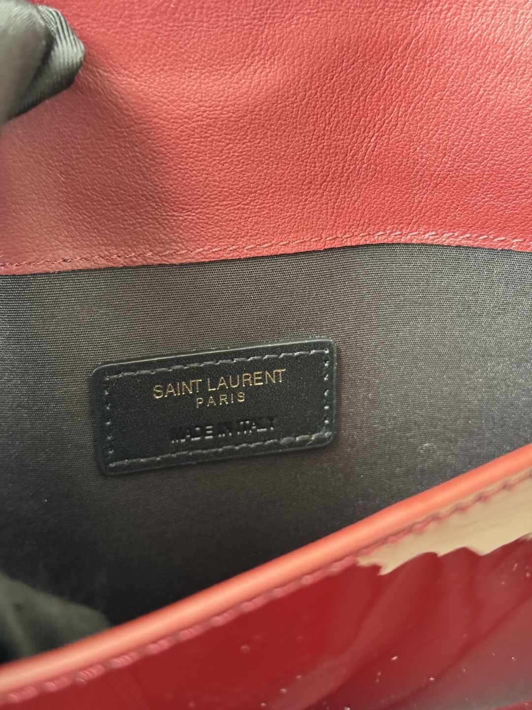 Saint Laurent Paris Clutch in Burgundy Patent Leather with Gold Logo 8 cmp i1743756904145 7513 0 7