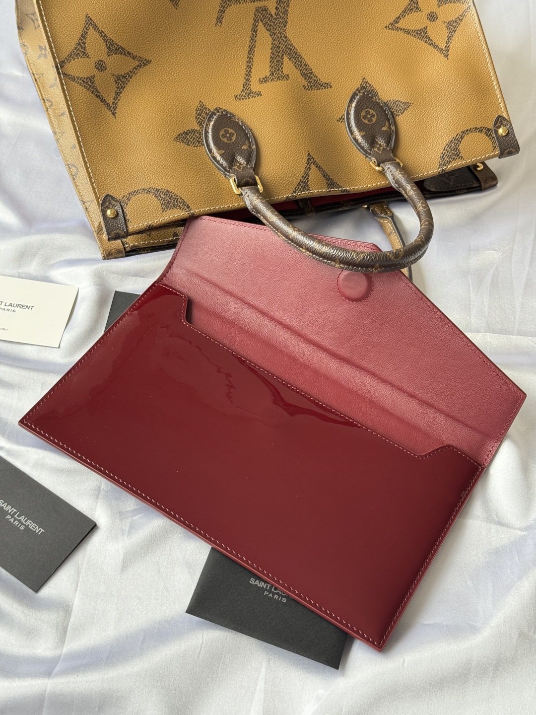 Saint Laurent Paris Clutch in Burgundy Patent Leather with Gold Logo 6 cmp i1743756910192 1132 0 5