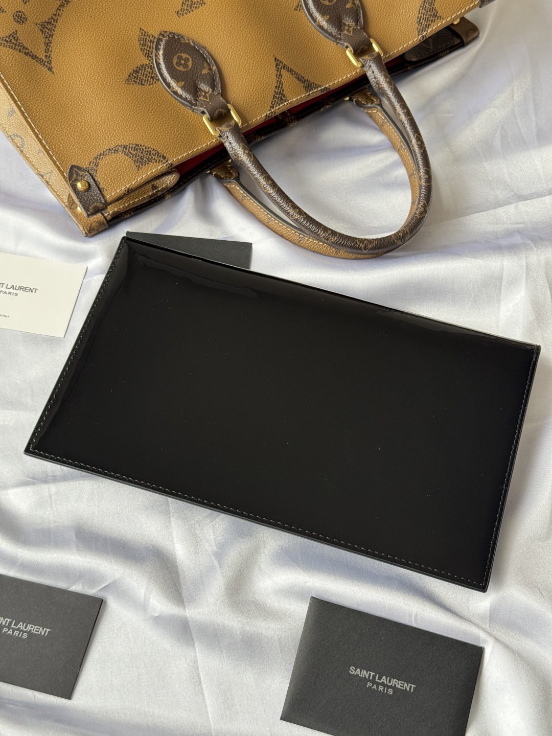 Yves Saint Laurent Black Patent Leather Clutch with Gold Logo 4 cmp i1743757047514 5378 0 2
