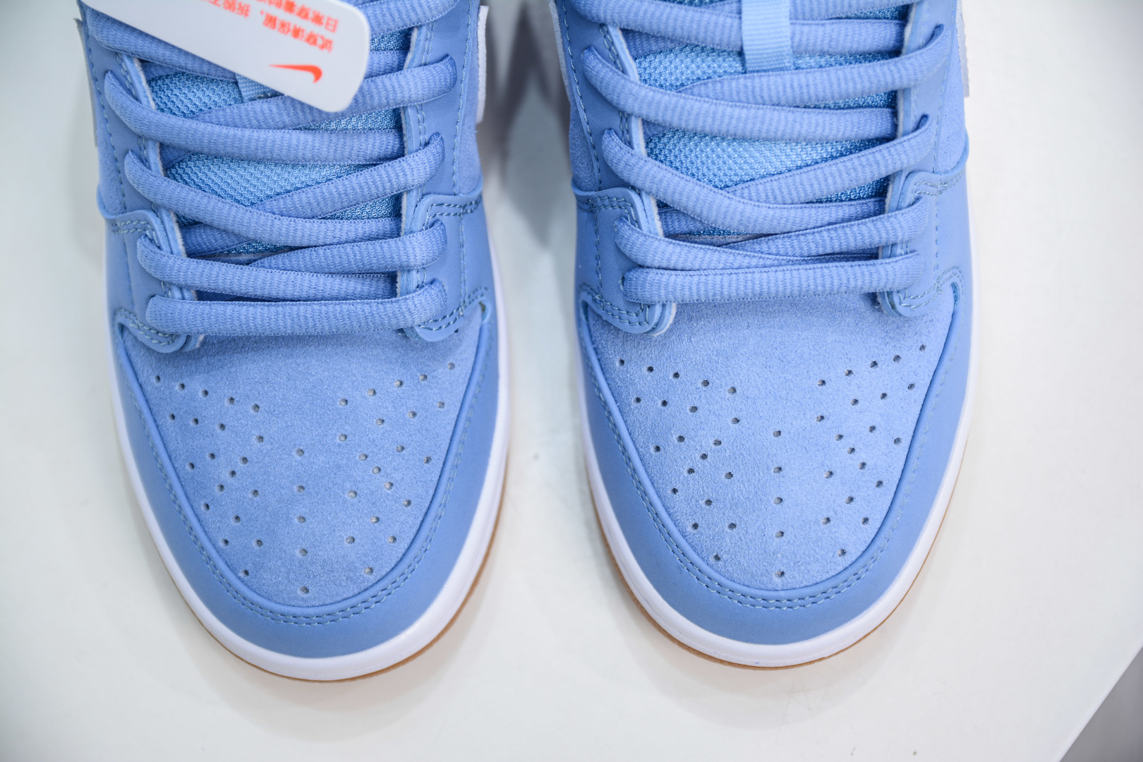 220  NIKE SB Dunk Low Pro ISO ”University Blue” 白蓝生胶  FJ1674-401