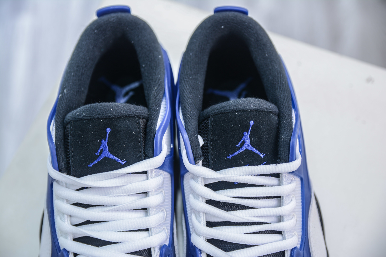 240 F版 Air Jordan AJ4 RM 重制版低帮复古篮球鞋 黑蓝 FQ7939-140