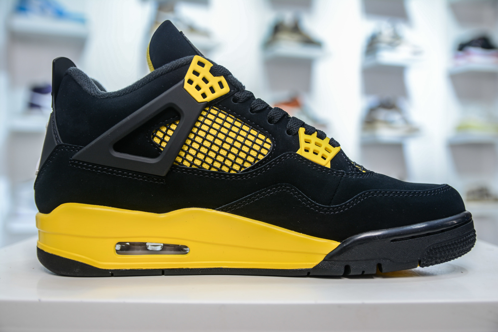 Air Jordan 4 Retro 'Thunder' Black/Yellow Premium Leather Sneaker 3 cmp i1747158453424 4510 0 2