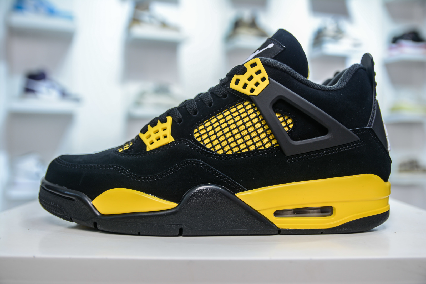 Air Jordan 4 Retro 'Thunder' Black/Yellow Premium Leather Sneaker 1 cmp i1747158453425 3045 0 0