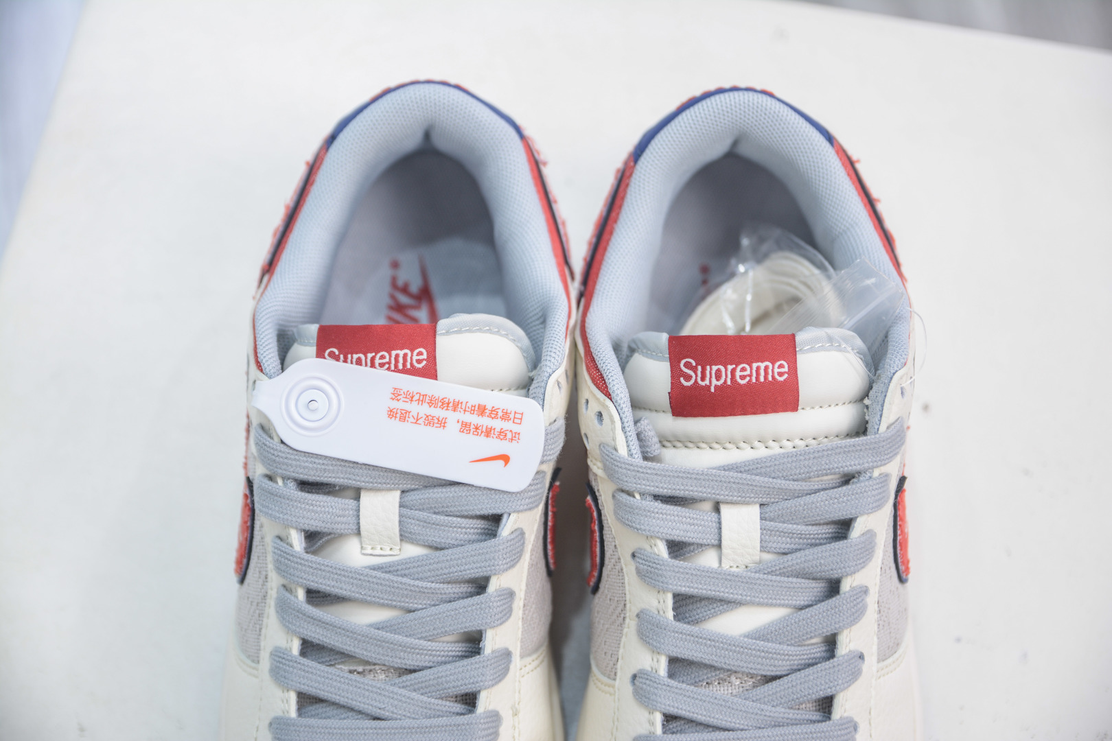 Nike SB Dunk Low x Supreme White/Coastal Blue/Varsity Red Sneakers 8 cmp i1754320025927 5918 0 7