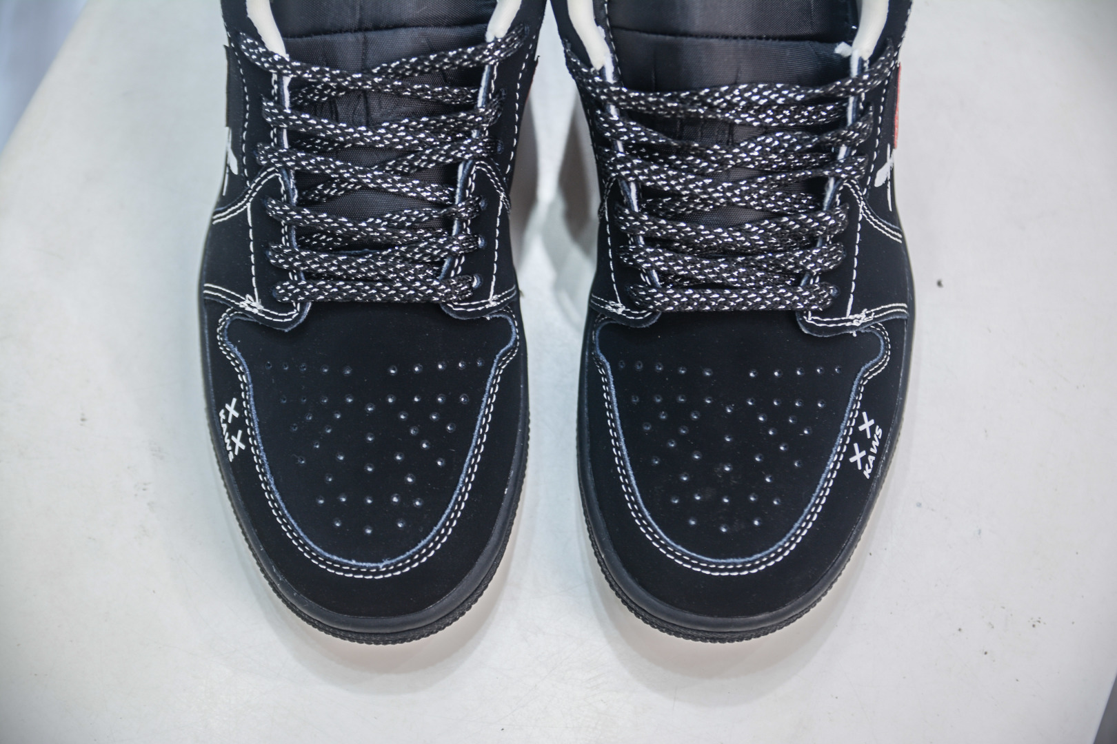 Kaws x Air Jordan 1 Low Black Red: Limited Edition Sneaker for Men and Women 9 cmp i1756912655862 6535 0 8