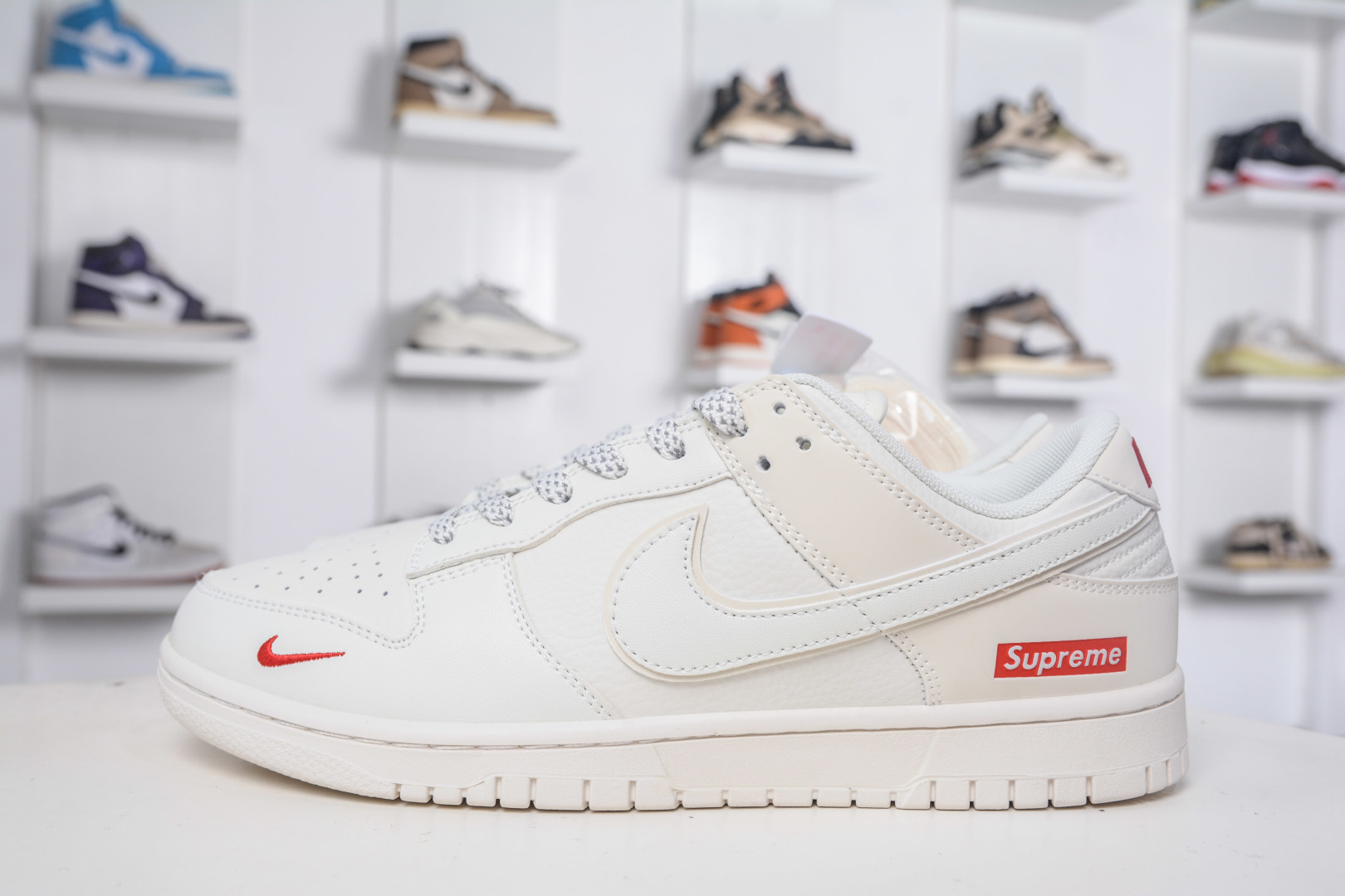 Nike SB Dunk Low x Supreme Collab - Premium Leather, Stylish Cream/Red Sneakers