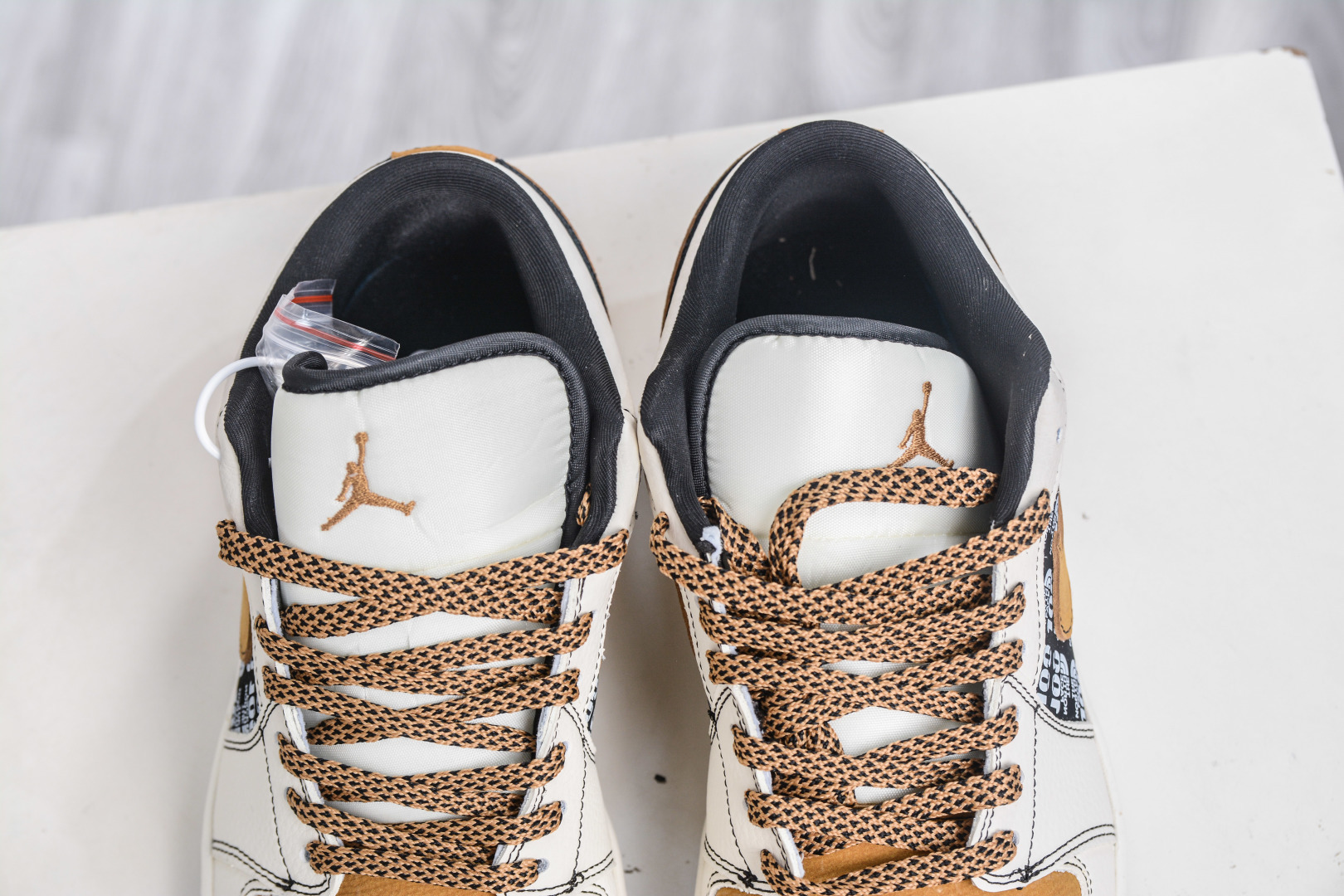 Air Jordan 1 Retro Low x The North Face Collab - White, Black, and Desert Yellow 8 cmp i1758395048367 4348 0 7